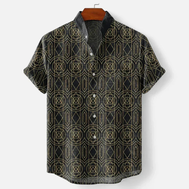 Close-up of the vibrant artistic print on a men's short sleeve button-up shirt, great for summer.