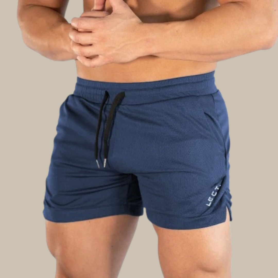 Close-up of men's short leg athletic trunks with adjustable drawstring waist for comfortable active wear.