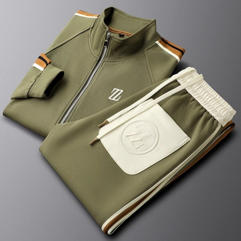 Man wearing a comfortable men's athletic tracksuit with zip jacket and stripe, ideal for active lifestyle.