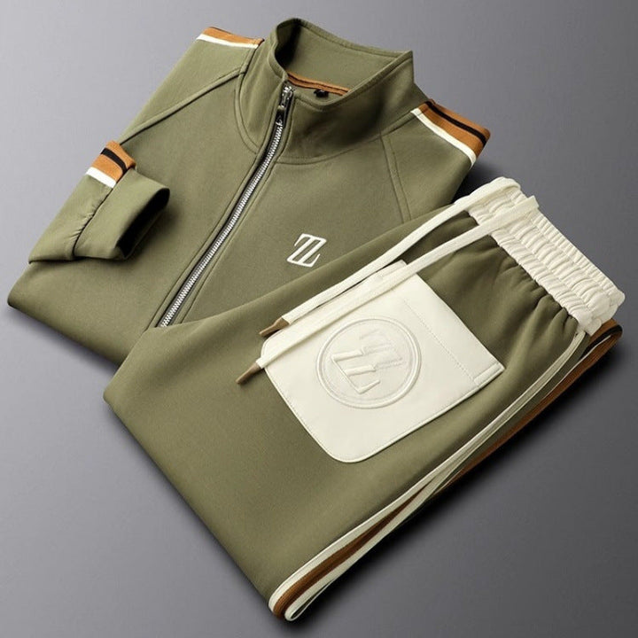 Man wearing a comfortable men's athletic tracksuit with zip jacket and stripe, ideal for active lifestyle.