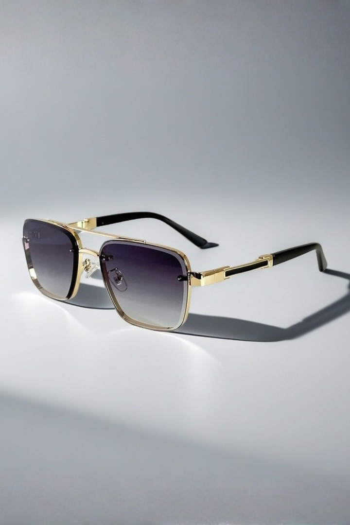 Elegant men's square aviator sunglasses. Gold-finished frame and gradient lenses complete any fashion look.