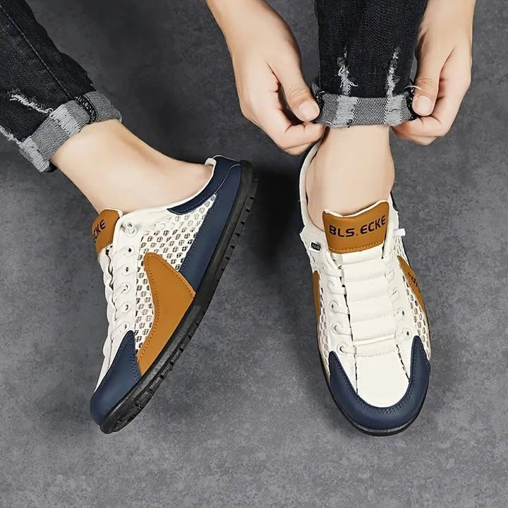 Stylish men's backless trainers with a functional lace-up design, offering a secure yet casual fit.