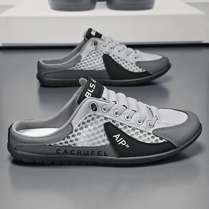 Fashionable men's backless trainers for quick slip-on convenience, a modern choice for casual footwear.