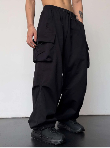 Versatile men's loose fit cargo pants. Baggy wide leg design offers casual comfort for daily wear.