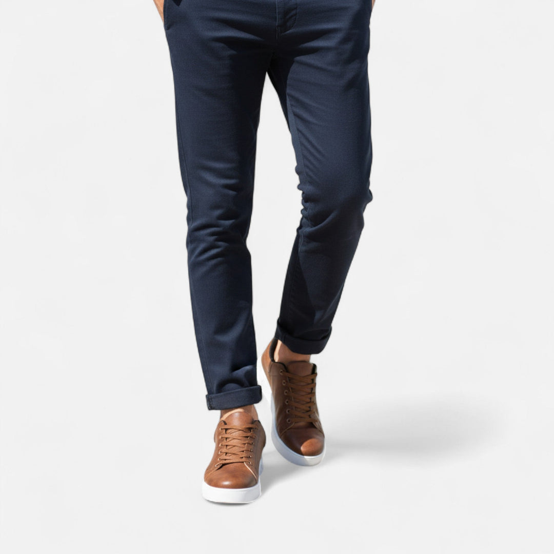 Timeless men's black sneakers, perfect for all-season casual wear. Comfortable, stylish lace-up everyday footwear.