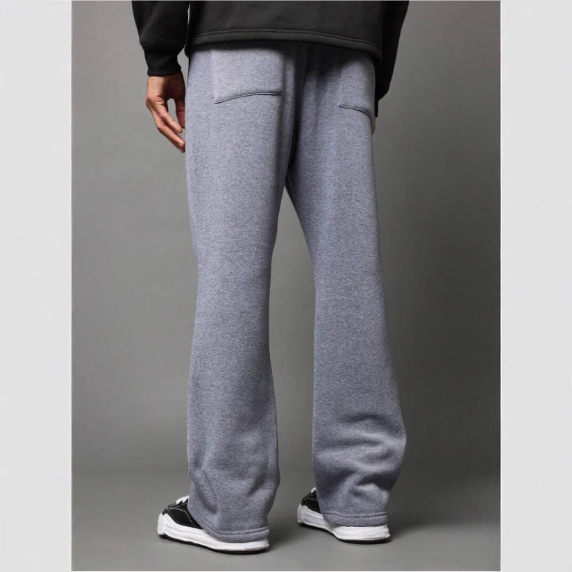 Men's stylish flared sweatpants in black, grey, purple. Relaxed fit, drawstring, comfortable casual wear.