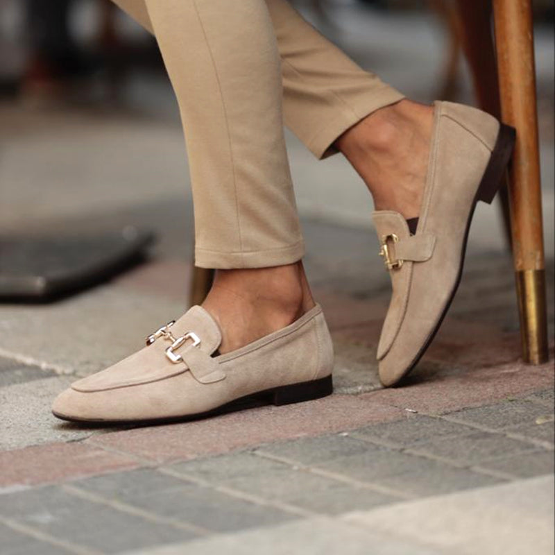 Men's black horsebit loafers; sleek slip-on formal dress shoes for elegant style and comfort.