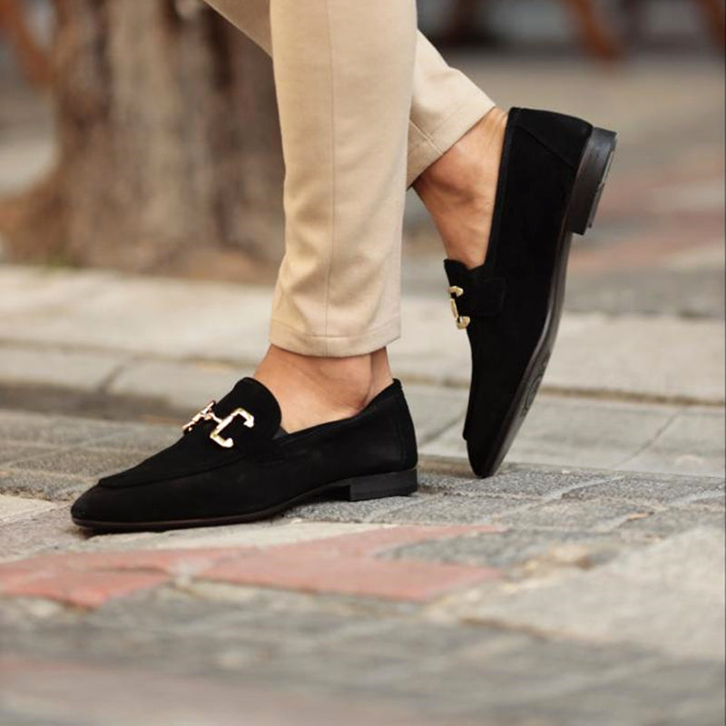 Stylish men's slip-on horsebit loafers; comfortable, sleek footwear perfect for dressy or smart casual wear.