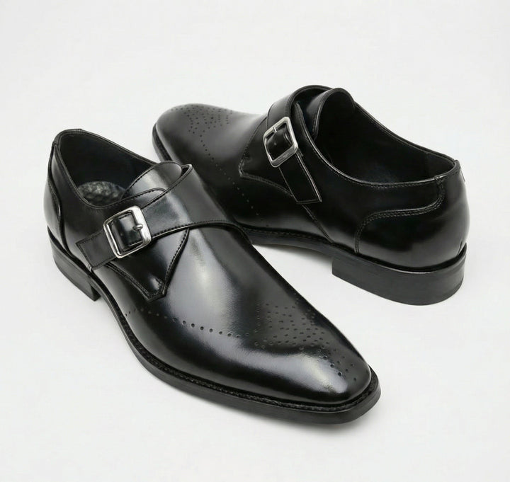 Men's black Italian leather loafers, classic fit, elegant slip-on dress shoes for formal and professional wear.