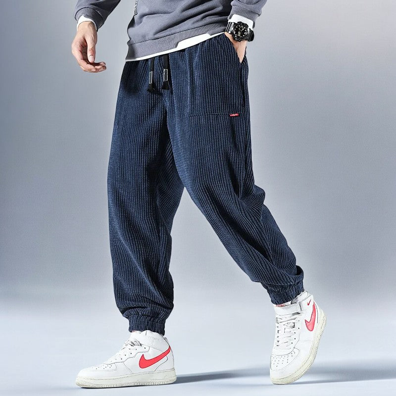 Men's black Japanese style sweatpants, comfortable relaxed fit joggers for modern streetwear and everyday wear.