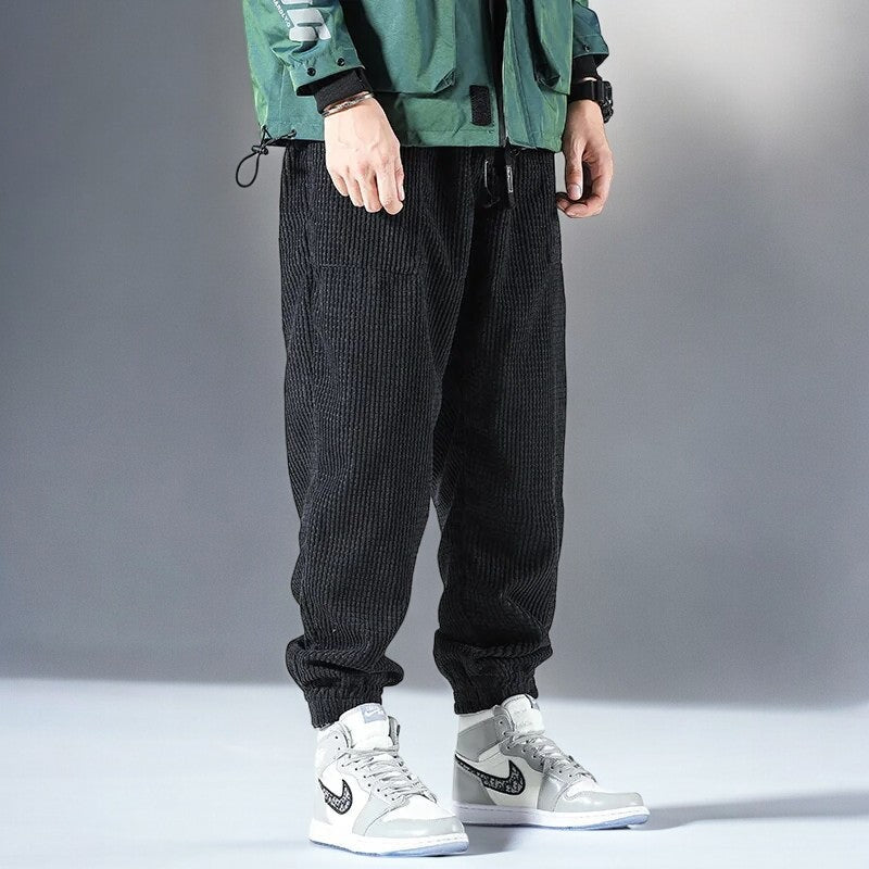 Versatile men's Japanese casual sweatpants, blending comfort with a modern relaxed fit for lounge and streetwear.