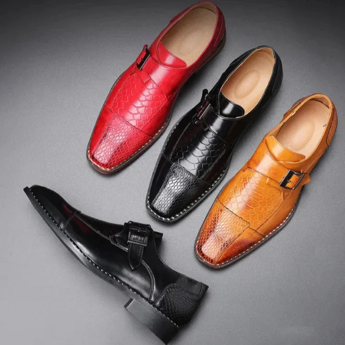 Men's formal leather footwear: a classic monk strap shoe with an elegant single buckle for any event.
