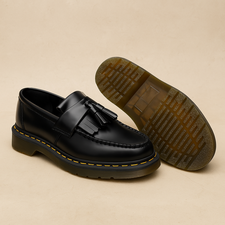 Comfortable men's blue tassel loafers, stylish slip-on casual footwear ideal for versatile everyday fashion.