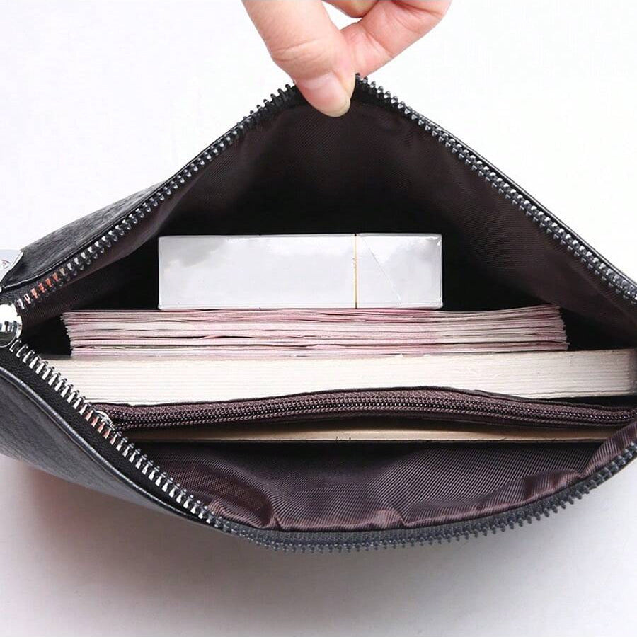 Premium leather men's business zip clutch wallet. Sleek, professional carry for an executive look.