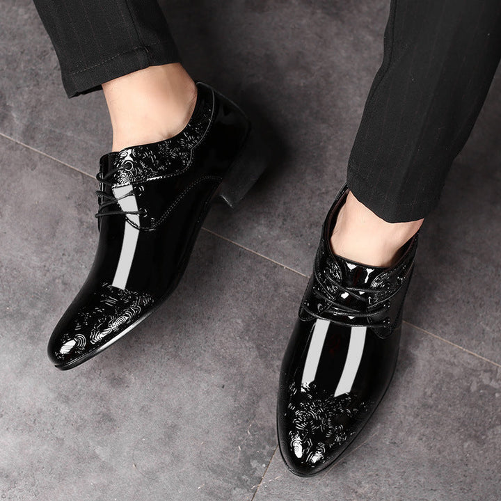 Formal men's black patent leather Derby shoes, lace-up style with subtle embossed details, ideal for business attire.