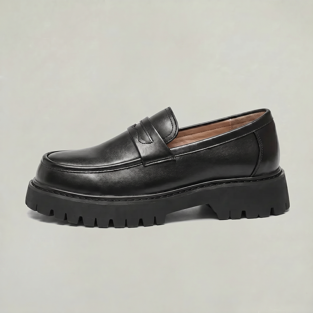 Stylish men's platform loafers with a chunky sole, perfect slip-on dress shoes for contemporary fashion.