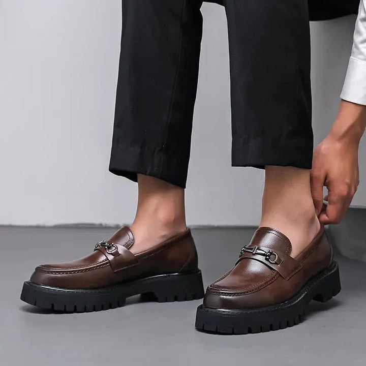 Elegant mens smart casual loafers with a polished metal buckle, easy slip-on style for versatility.