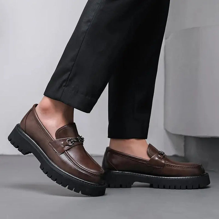 Versatile gentleman's slip-on loafers, featuring a sleek metal buckle, for comfortable & stylish footwear.