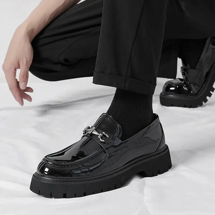 High-quality men's slip-on loafers, with a stylish metal buckle, offering comfort & elegant design.