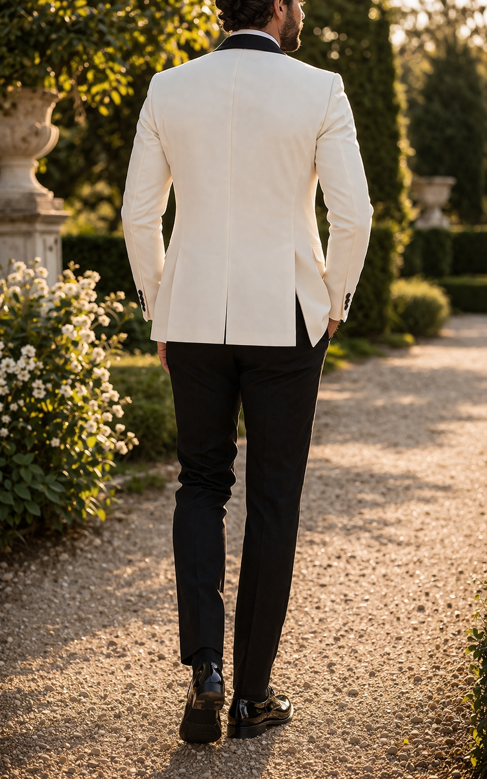 Elegant men's white three-piece tuxedo suit featuring a sleek shawl lapel, ideal groom attire for weddings.