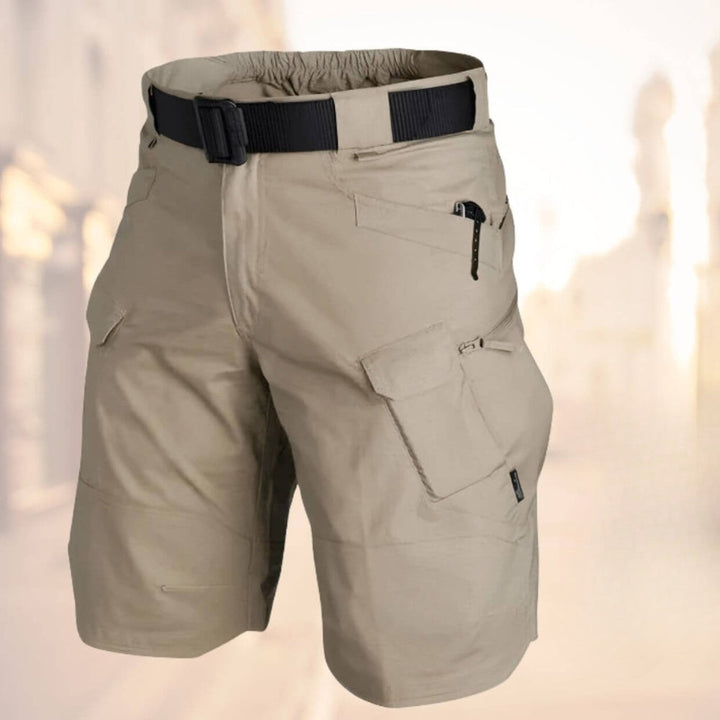 Khaki men's cargo shorts for adventure & style. Multi-pocket design offers practical utility & comfort.