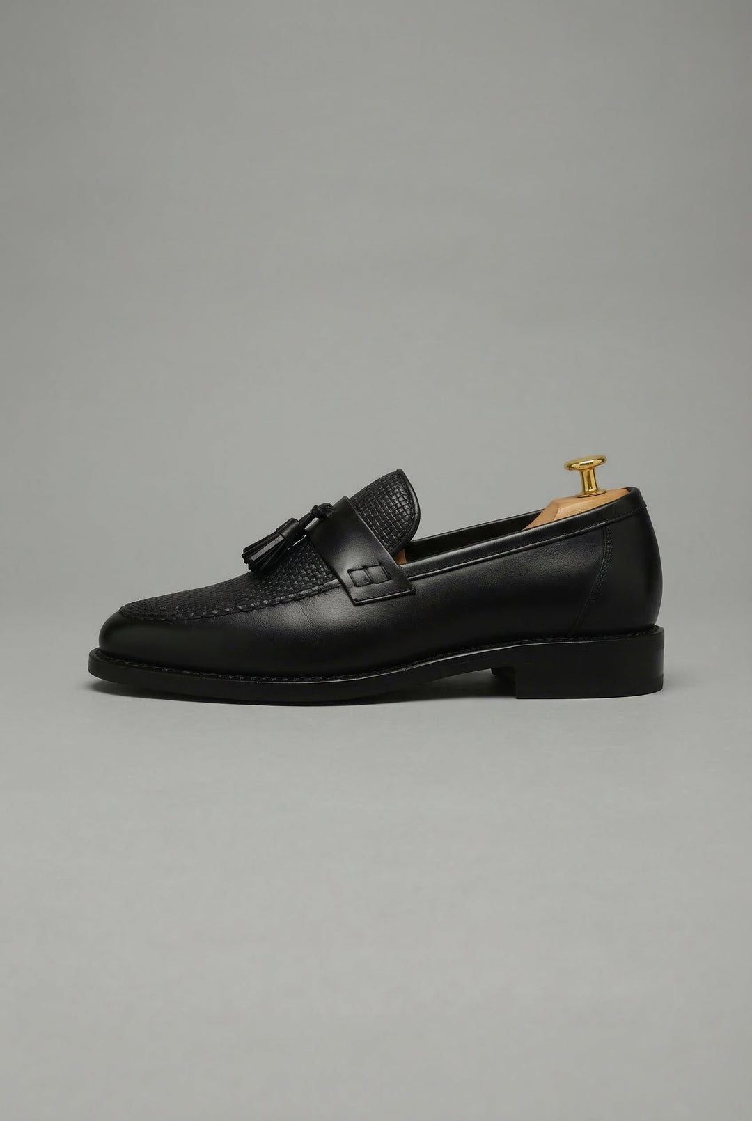 Elegant men's woven design loafers with tassels, ideal for smart casual & dress.