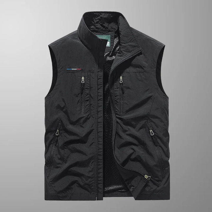 Versatile men's outdoor vest, sleeveless bodywarmer with full zip & stand collar feature.