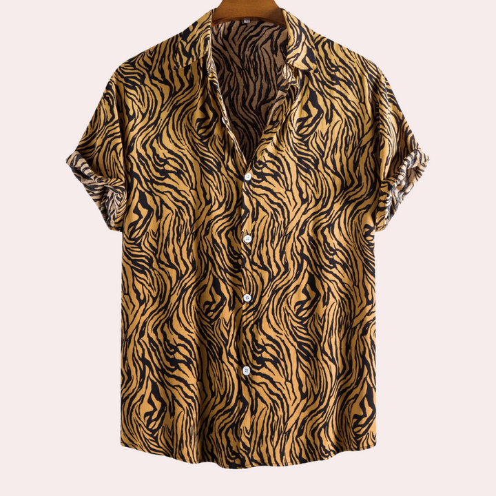 Men's bold yellow tiger print short sleeve shirt, relaxed fit. Perfect for casual summer fashion and statement style.