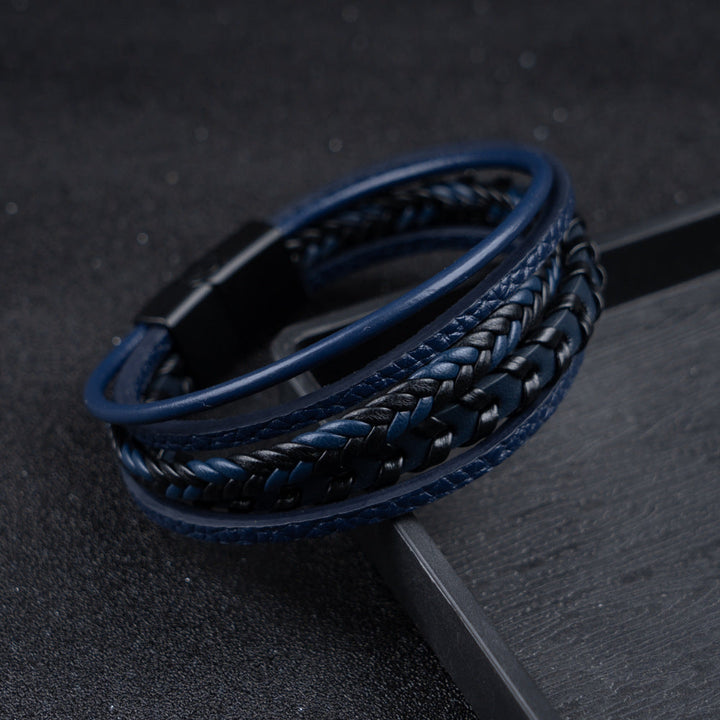 Statement men's bracelet: rugged braided leather with a strong magnetic clasp. Viking fashion.