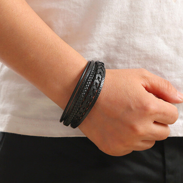 Giftable men's Viking bracelet, featuring intricate braided leather and a secure magnetic clasp.