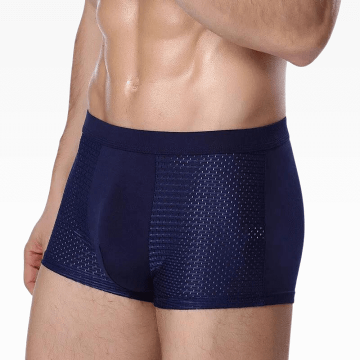 Close-up of men's soft boxer shorts fabric, highlighting breathable everyday comfort.