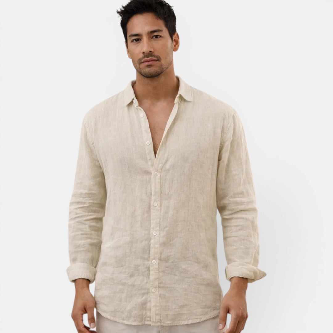 Relaxed fit men's button-up shirt, ideal for warm weather, offering sophisticated casual style.