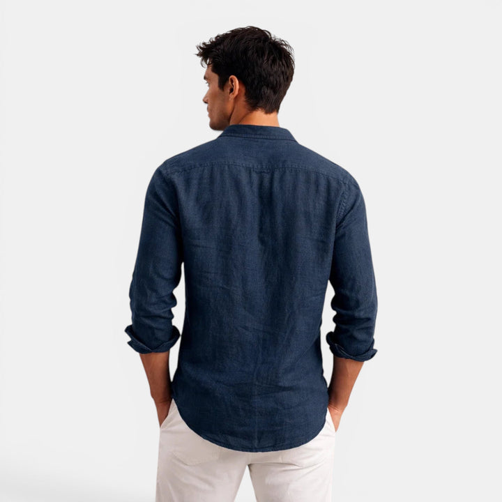 Navy men's long sleeve button-up shirt, classic menswear with a relaxed fit for casual style.