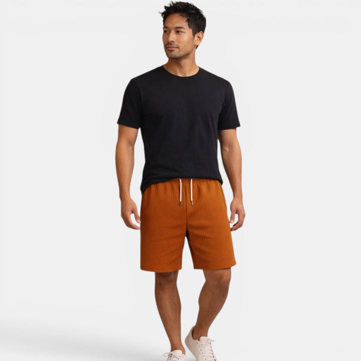 Vacation-ready men's regular fit shorts, breathable, for a stylish casual look.