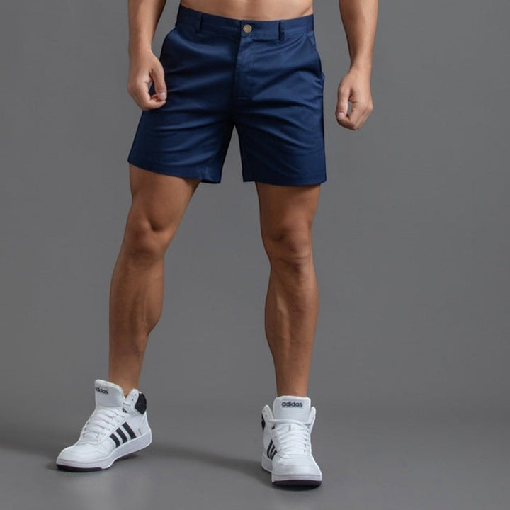 Breathable men's chino shorts, ideal for summer fashion, offering comfort & timeless casual style.