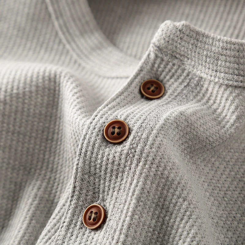 Stylish men's waffle long sleeve henley, ideal for comfortable everyday fashion.