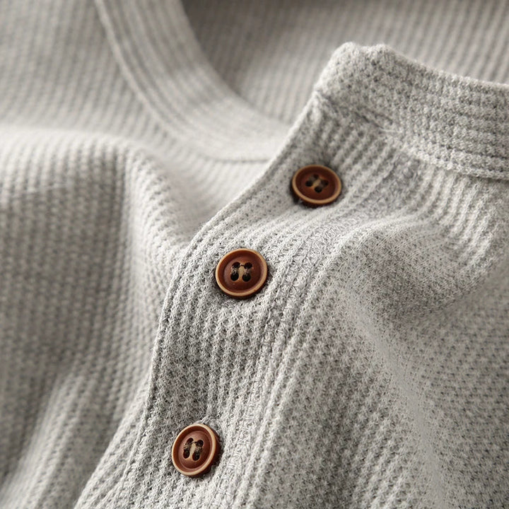 Stylish men's waffle long sleeve henley, ideal for comfortable everyday fashion.