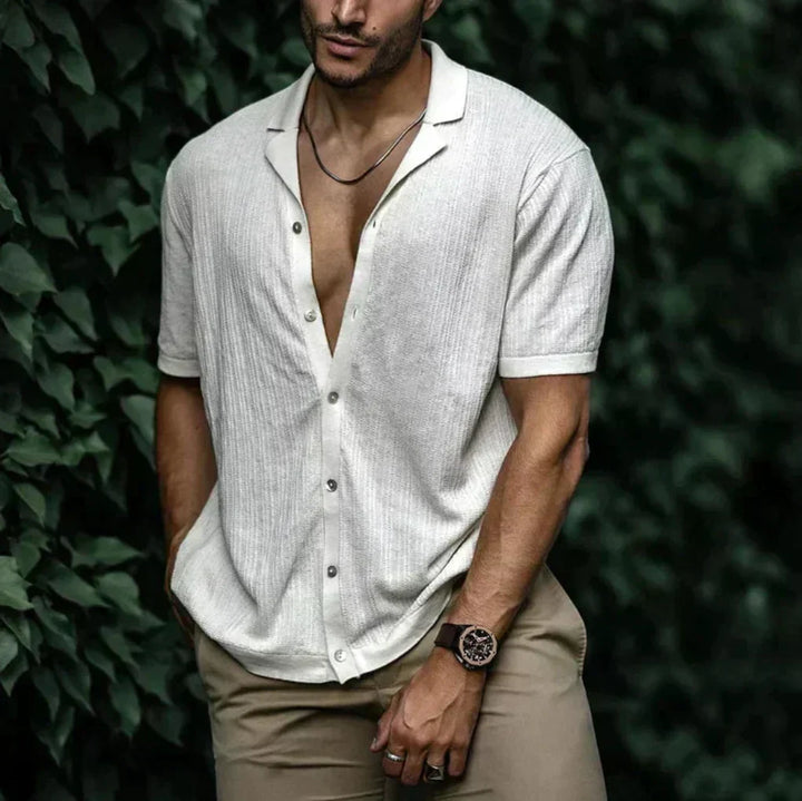 Comfortable men's breathable button-up shirt, ideal for warm weather and holidays.