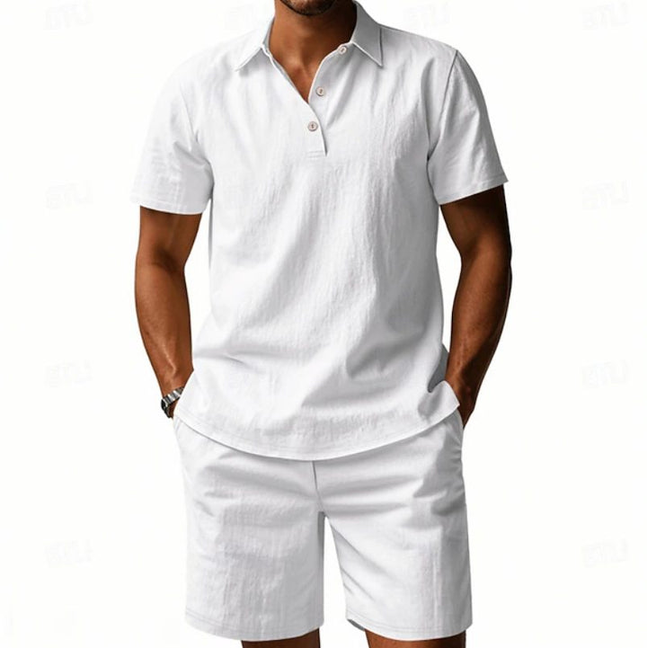 Man wearing a light colored linen polo shirt & shorts set, showcasing summer style and comfort.