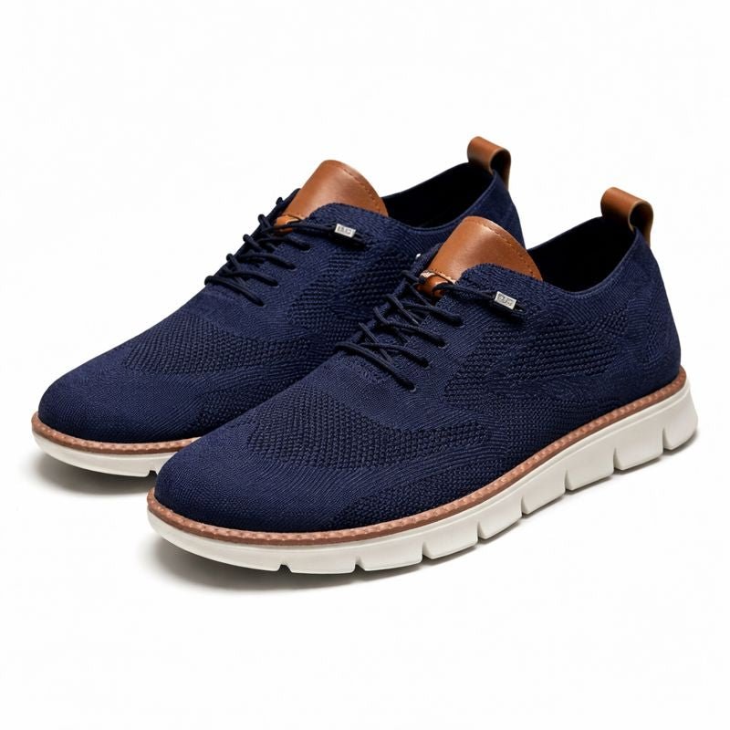 Men's casual mesh trainers with cushioned sole, offering breathable comfort and support.