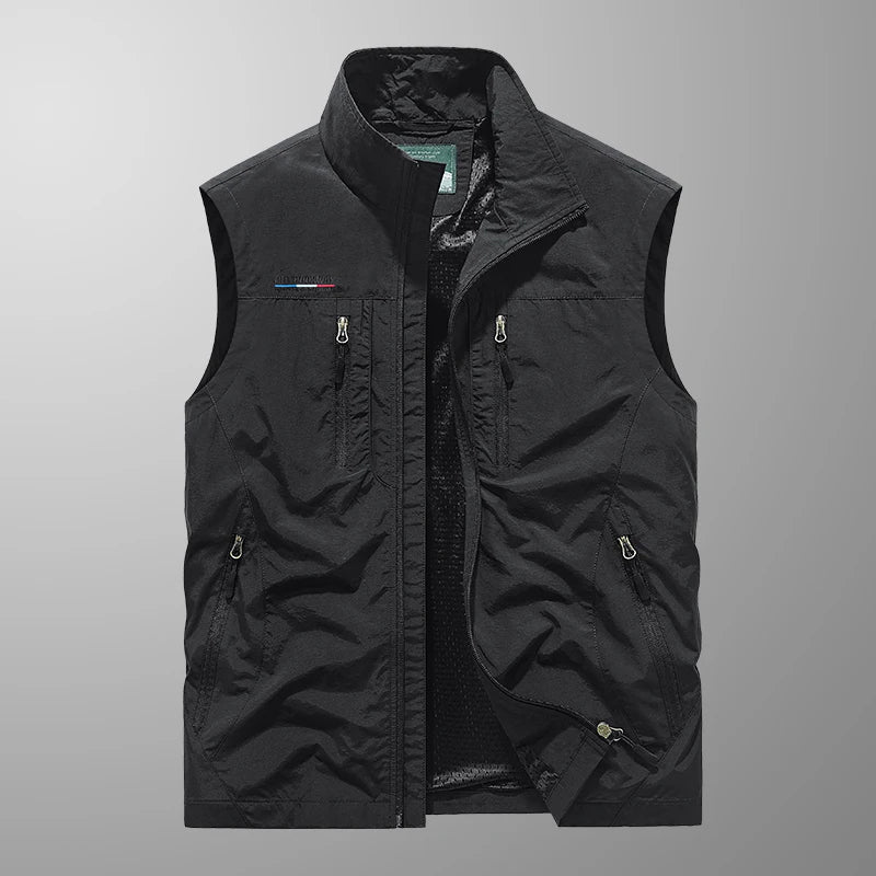 Lightweight men's utility vest with many pockets for essentials. Ideal breathable summer gear for fishing & hiking.