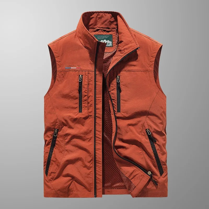 Men's breathable outdoor cargo vest with multiple pockets, ideal for fishing, hiking, and travel adventures.