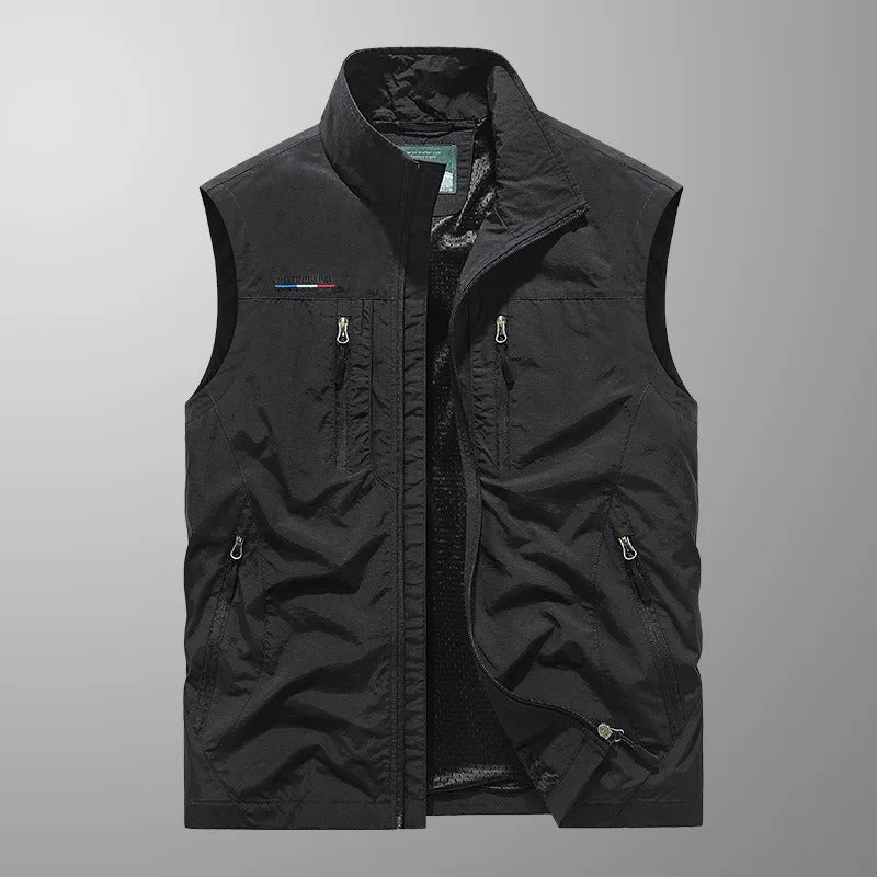 Lightweight men's utility vest for active outdoor adventures; features multi-pockets & breathable fabric.