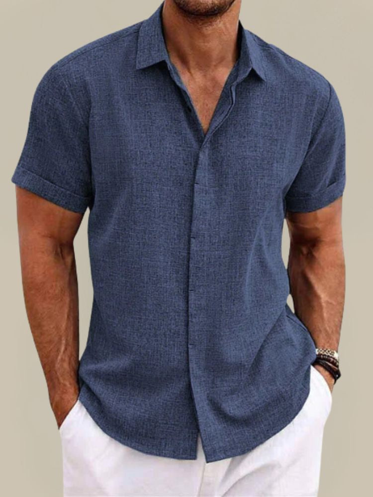 Men's breathable short sleeve button-up shirt for summer. Lightweight, relaxed fit, perfect for warm weather fashion.