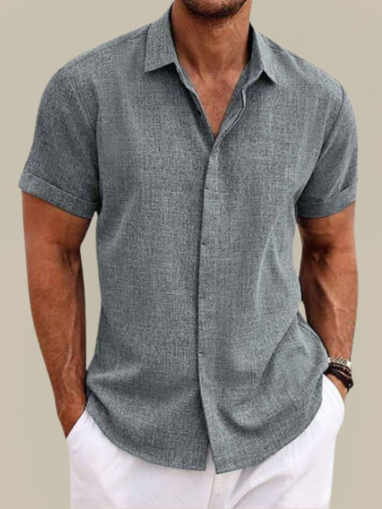 Lightweight men's short sleeve shirt. Breathable button-up, relaxed fit for ultimate summer comfort & style.