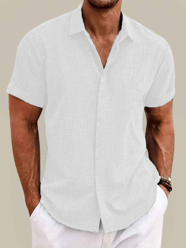 Relaxed fit men's short sleeve button-up. Breathable summer shirt, lightweight, perfect for casual warm weather.