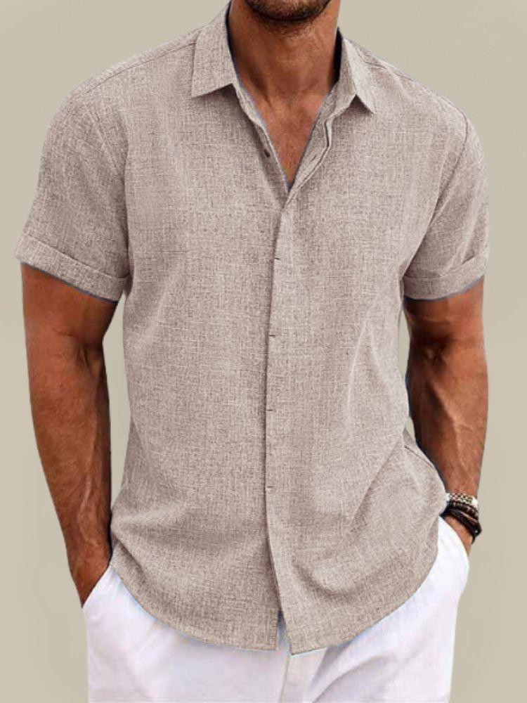 Men's short sleeve button-up shirt. Breathable, lightweight casual summer fashion. Relaxed fit for warm days.
