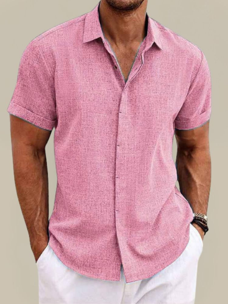 Stay cool in this men's breathable short sleeve button-up shirt. Lightweight, relaxed fit for summer fashion.