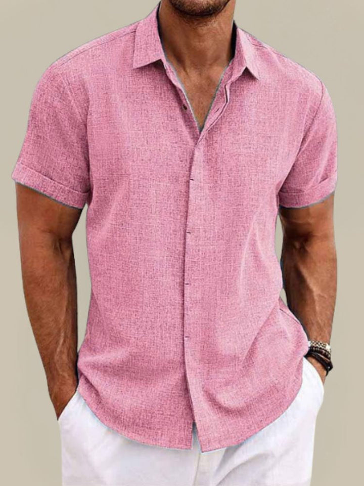 Stay cool in this men's breathable short sleeve button-up shirt. Lightweight, relaxed fit for summer fashion.