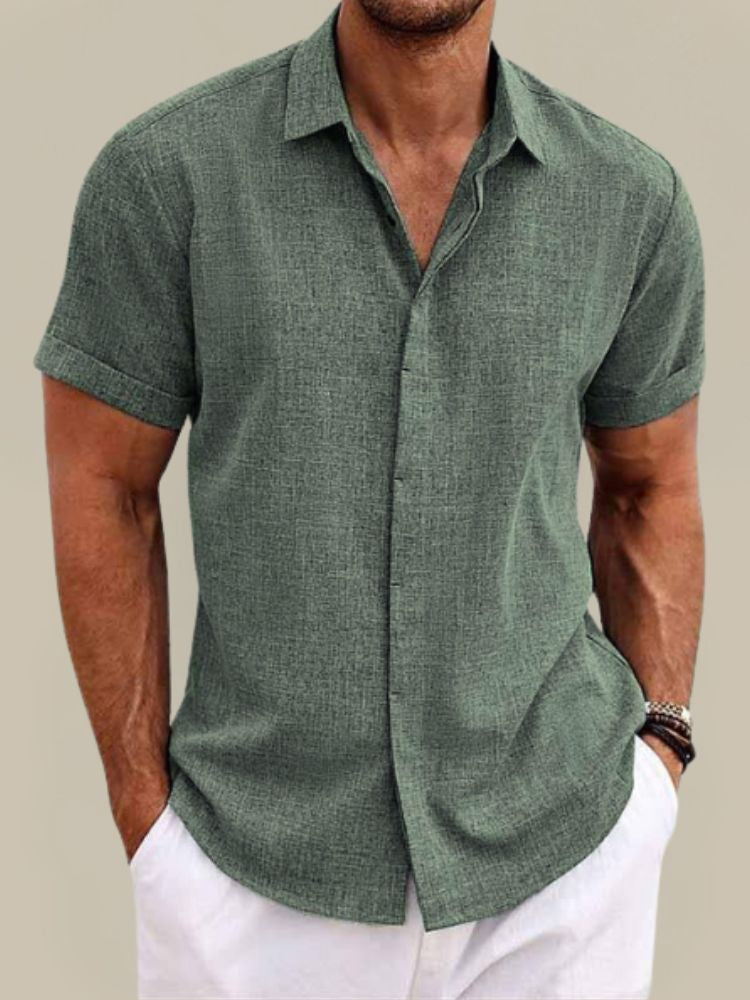 Fashionable men's short sleeve button-up. Breathable, lightweight casual shirt with a relaxed fit for summer.